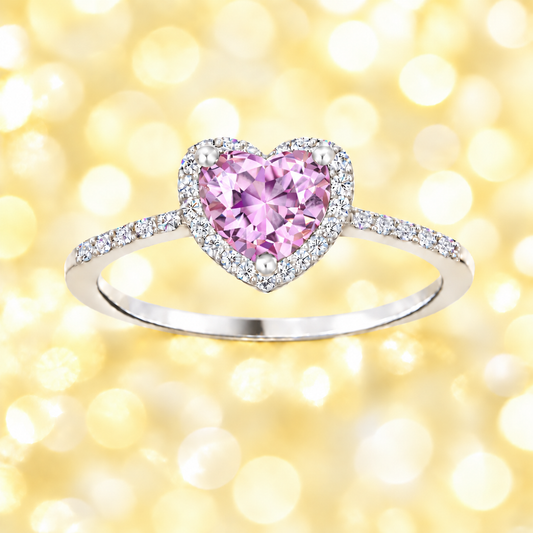 Pink amethyst ring with a 6 mm heart cut, crafted in white gold-plated 925 silver and accented with moissanite. Available now at BSI Jewelry.