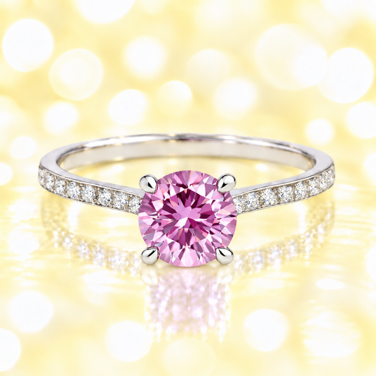 Pink amethyst ring with a 6 mm round-cut and moissanite accents, crafted in white gold-plated 925 silver. Elegant for daily wear. Available now at BSI Jewelry.