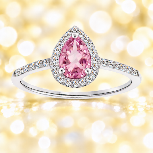 Pink amethyst ring with a 7×5 mm pear cut, with moissanite in white gold-plated 925 silver. Elegant and timeless for daily wear. Available now at BSI Jewelry.