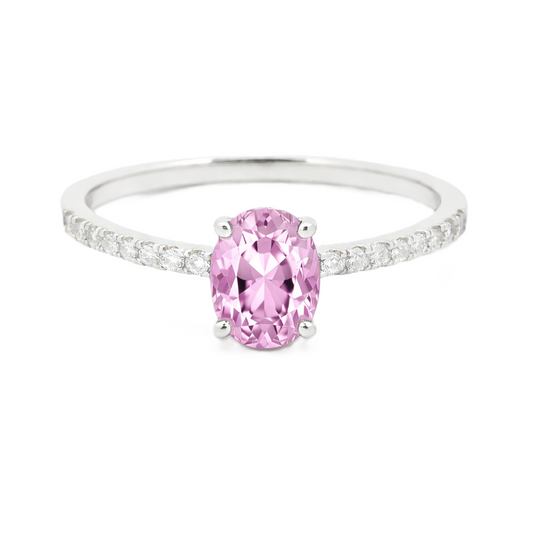 Pink amethyst ring with a 7×5 mm oval-cut stone and moissanite accents in white gold plated 925 silver. Elegant for daily wear. Available now at BSI Jewelry.