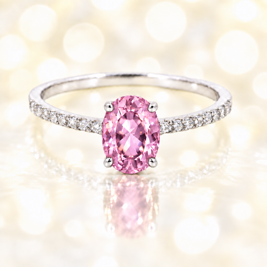 Pink amethyst ring with a 7×5 mm oval-cut stone and moissanite accents in white gold plated 925 silver. Elegant for daily wear. Available now at BSI Jewelry.