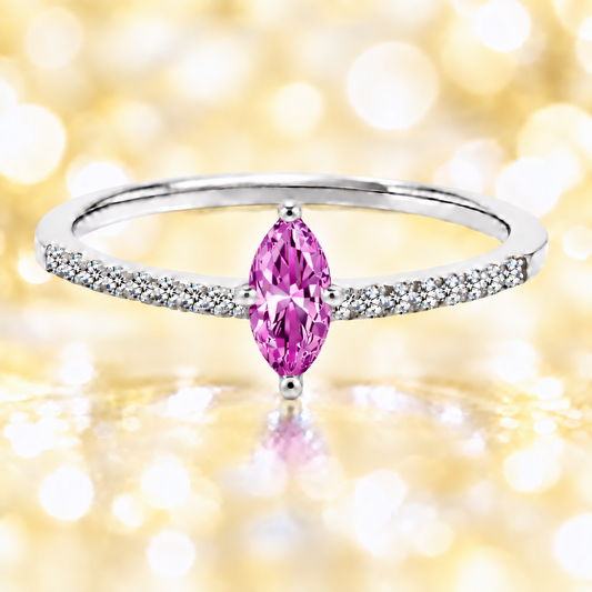 Pink amethyst ring with an 8×4 mm marquise-cut stone, accented by moissanite in white gold-plated 925 silver. Elegant and feminine. Available now at BSI Jewelry.