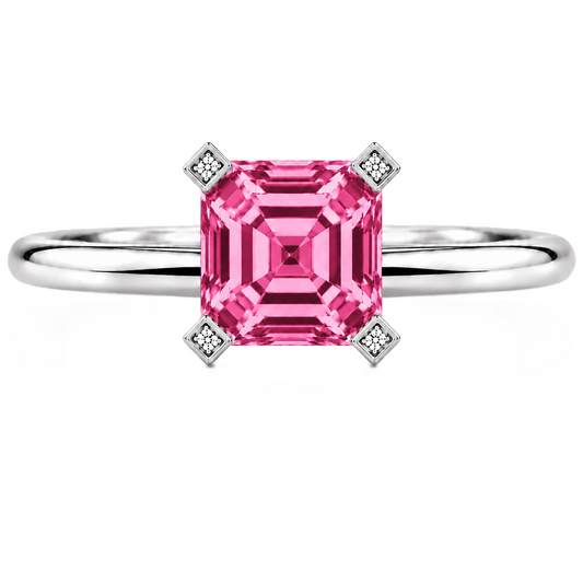 Romantic pink sapphire engagement ring with a 6 mm asscher-cut center stone, crafted in white gold plated 925 silver. Available now at BSI Jewelry.