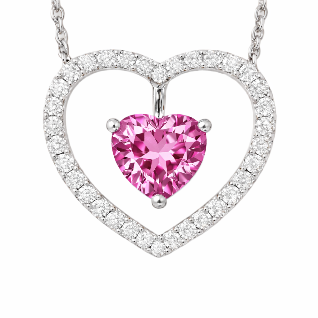 Pink sapphire necklace with a 6 mm heart cut and moissanite halo, crafted in white gold-plated 925 silver. Elegant and refined. Available now at BSI Jewelry.