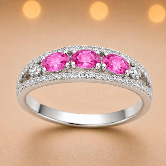 Pink sapphire ring with 5×3 mm oval stones in white gold-plated 925 silver. Elegant, hypoallergenic, and perfect for daily wear. Available now at BSI Jewelry.