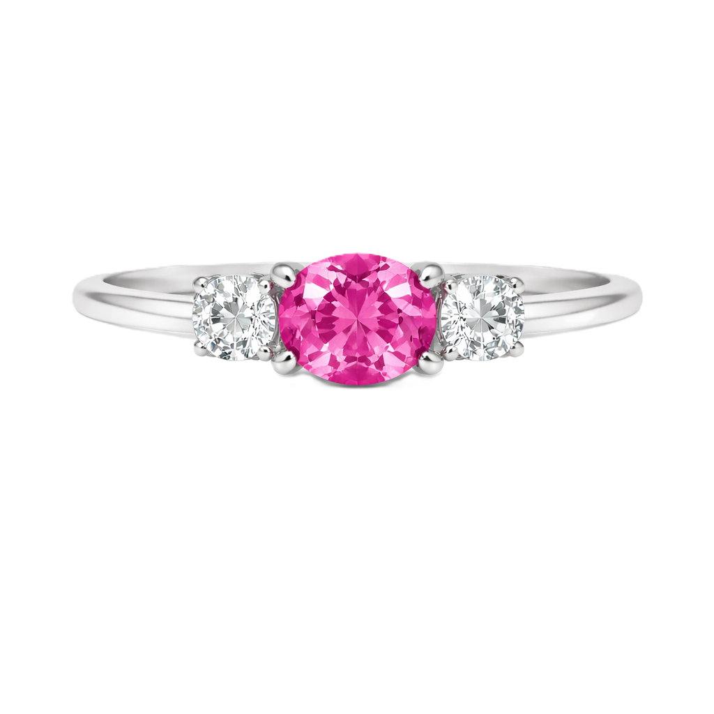 Pink sapphire ring, 5×4 mm oval with moissanite accents in white gold-plated 925 silver. Elegant and hypoallergenic. Available now at BSI Jewelry.