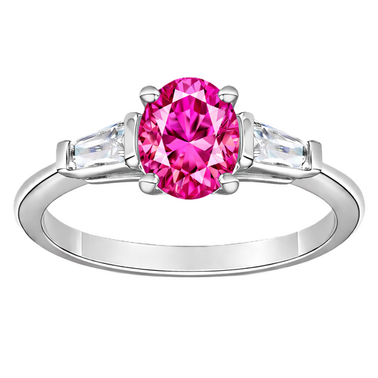 Pink sapphire ring with 7×5 mm oval center in white gold-plated 925 silver. Elegant, feminine, and hypoallergenic. Available now at BSI Jewelry.