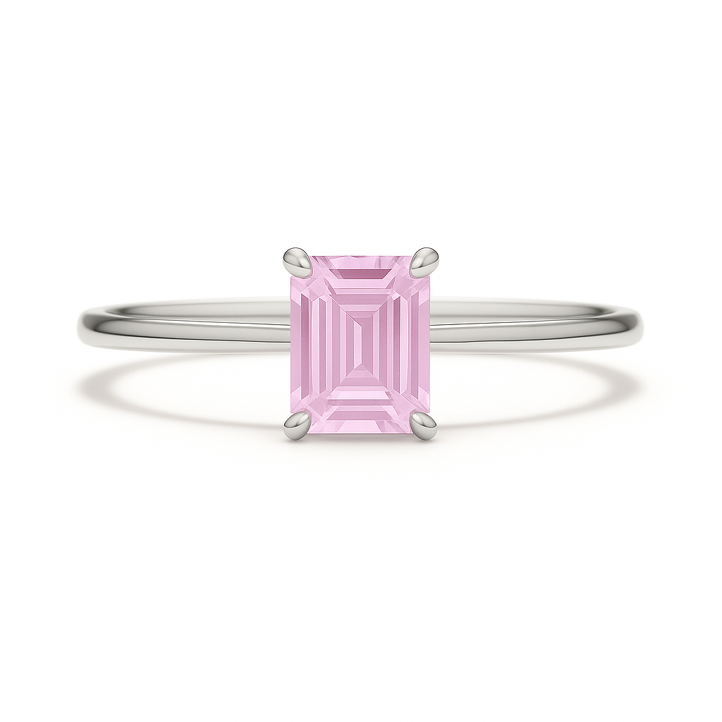 Elegant 6×4 mm emerald-cut pink sapphire ring crafted in white gold-plated 925 silver with palladium alloy. Timeless brilliance. Available now at BSI Jewelry.