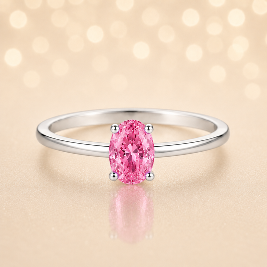 Pink sapphire solitaire ring with a 6×4 mm oval in white gold-plated 925 silver. Elegant, minimal, and timeless for daily wear. Available now at BSI Jewelry.