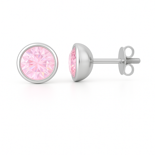 Pink sapphire stud earrings with 5mm round stones, crafted in white gold-plated 925 silver. Graceful sparkle and timeless elegance. Available now at BSI Jewelry