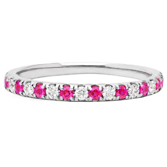 Pink sapphire wedding band with 1.80 mm round-cut stones, crafted in white gold-plated 925 silver and accented with moissanite. Available now at BSI Jewelry.