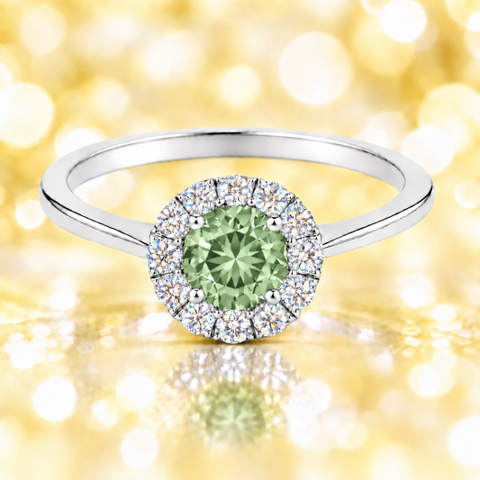 Prasiolite ring with a 4.50 mm round-cut stone in white gold-plated 925 silver, accented with moissanite for soft green brilliance. Available now at BSI Jewelry.