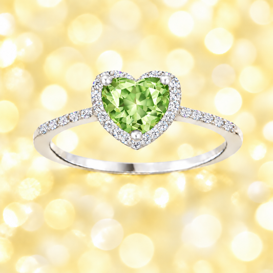 Prasiolite ring with a 6 mm heart cut, crafted in white gold-plated 925 silver and accented with moissanite. Available now at BSI Jewelry.