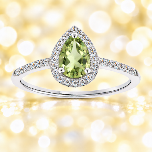 Prasiolite ring with a 7×5 mm pear cut, with moissanite in white gold-plated 925 silver. Elegant and timeless for daily wear. Available now at BSI Jewelry.