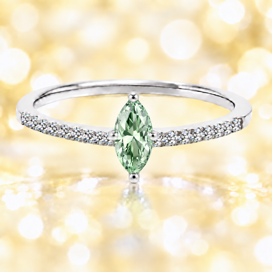 Prasiolite ring with an 8×4 mm marquise-cut stone, accented by moissanite in white gold-plated 925 silver. Elegant and refreshing. Available now at BSI Jewelry.