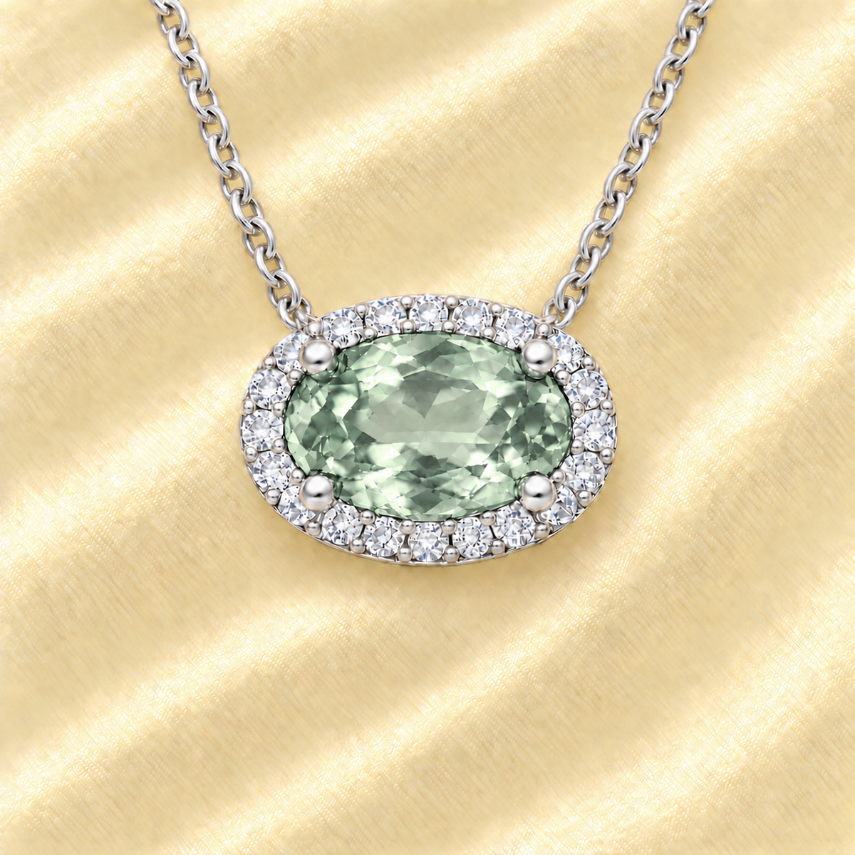 Prasolite necklace with 8×5 mm oval gemstone in white gold-plated 925 silver, accented with moissanite. Soft and elegant. Available now at BSI Jewelry.