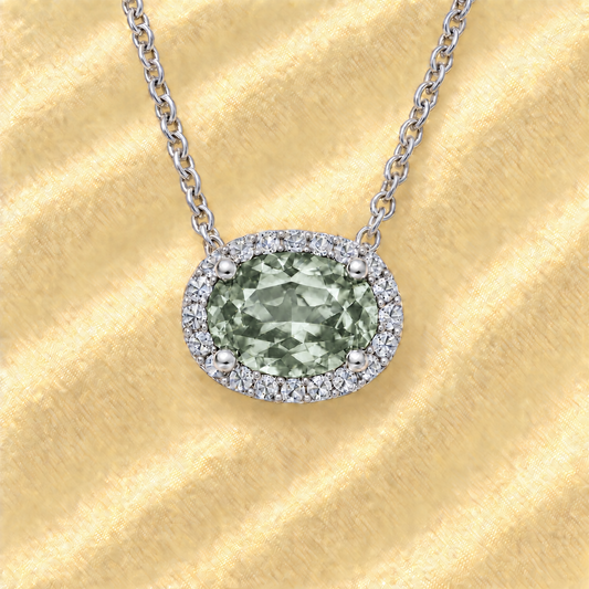 Moissanite and prasolite necklace with 9×7 mm oval gemstone in white gold-plated 925 silver with moissanite. Fresh and elegant. Available now at BSI Jewelry.