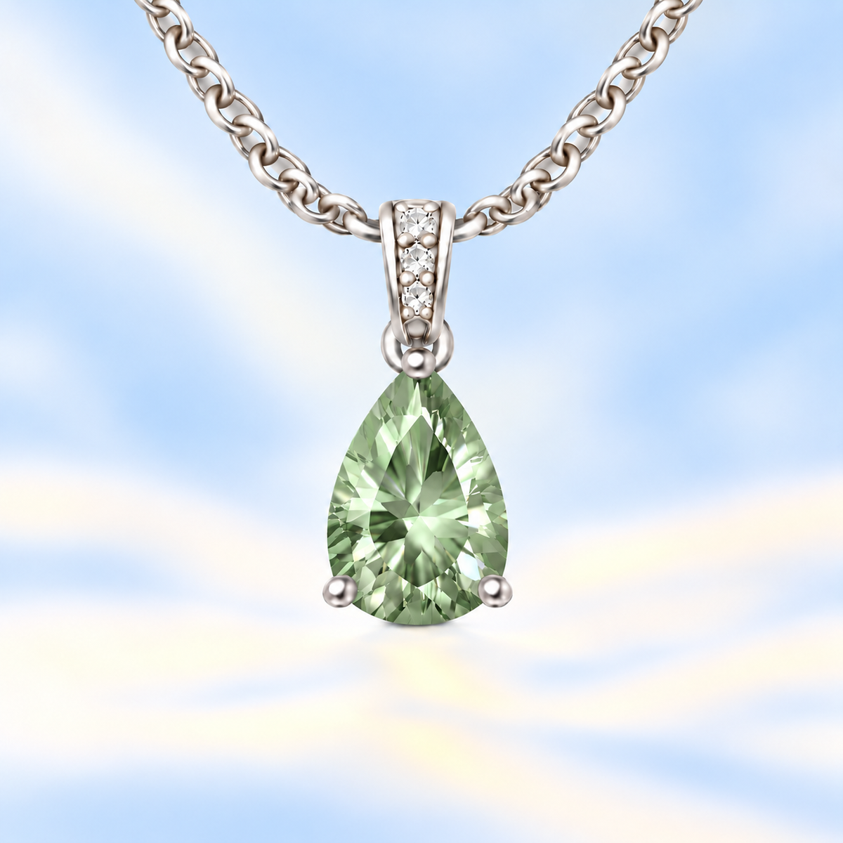 Prasolite pendant with an 8×5 mm pear cut, crafted in white gold-plated 925 silver. Fresh and elegant for daily wear. Available now at BSI Jewelry.