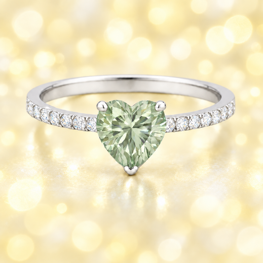 Prasolite ring with a 6 mm heart in white gold-plated 925 silver, with moissanite. Romantic and elegant for daily wear. Available now at BSI Jewelry.