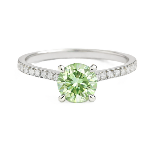 Prasolite ring with a 6 mm round-cut and moissanite accents, crafted in white gold-plated 925 silver. Elegant for daily wear. Available now at BSI Jewelry.