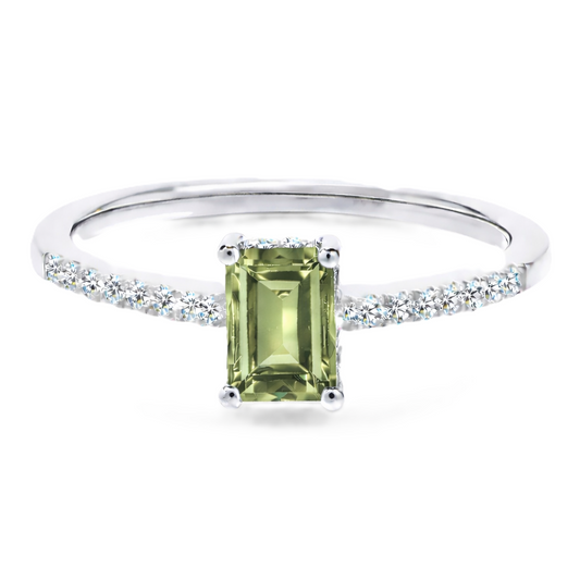 Prasolite ring with a 7×5 mm emerald cut in white gold-plated 925 silver, with moissanite. Elegant and refined for daily wear. Available now at BSI Jewelry.