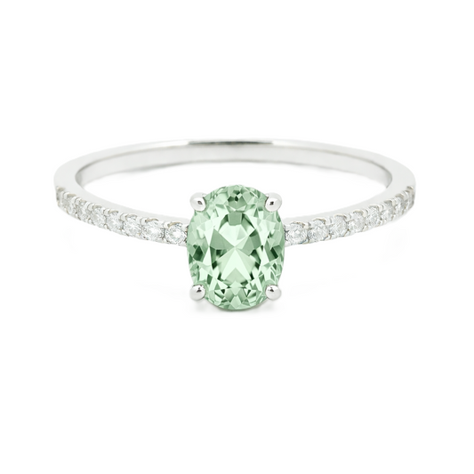 Prasolite ring with a 7×5 mm oval-cut stone and moissanite accents in white gold plated 925 silver. Elegant for daily wear. Available now at BSI Jewelry.