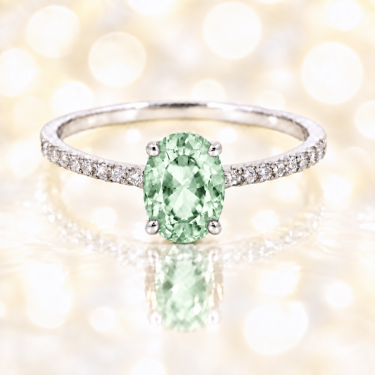 Prasolite ring with a 7×5 mm oval-cut stone and moissanite accents in white gold plated 925 silver. Elegant for daily wear. Available now at BSI Jewelry.