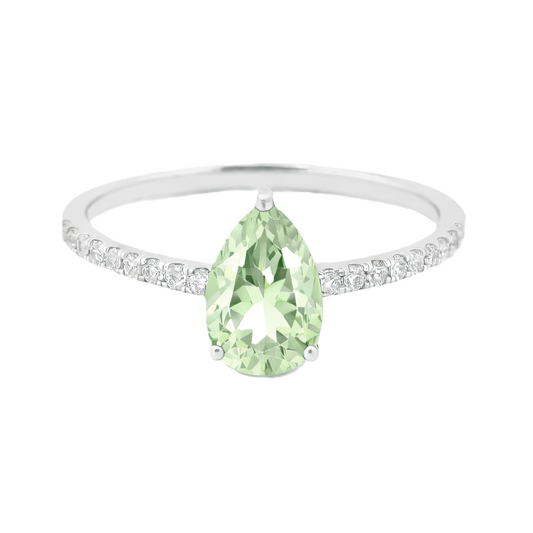 Prasolite ring with a 7×5 mm pear-cut stone and moissanite accents in white gold plated 925 silver. Elegant for daily wear. Available now at BSI Jewelry.