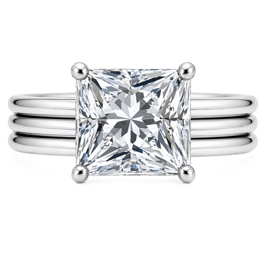 Princess cut moissanite ring, 10 mm, set in white gold plated 925 silver. Sharp brilliance with modern elegance. Available now at BSI Jewelry.