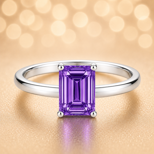 7×5 mm emerald-cut purple sapphire solitaire ring set in white-gold-plated 925 silver. Minimalist design with timeless elegance. Available now at BSI Jewelry.