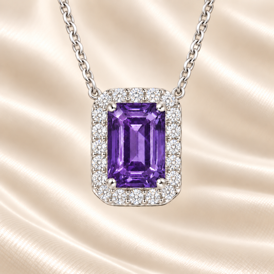 Purple sapphire emerald cut necklace with 7×5 mm center stone in white gold-plated 925 silver. Elegant and distinctive for everyday wear. Available at BSI Jewelry.