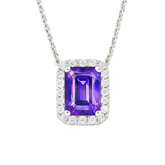 Purple sapphire emerald cut pendant with 7×5 mm center stone in white gold-plated 925 silver. Elegant and distinctive for everyday wear. Available at BSI Jewelry.