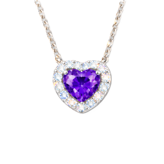 Purple sapphire heart pendant with 6 mm center stone in white gold-plated 925 silver. Elegant and romantic for everyday wear. Available now at BSI Jewelry.