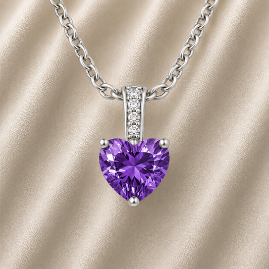 Purple sapphire pendant with a 6 mm heart cut, crafted in white gold-plated 925 silver. Elegant and refined for daily wear. Available now at BSI Jewelry.
