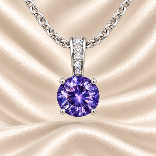 Purple sapphire pendant with a 6 mm round cut, set in white gold-plated 925 silver. Elegant, rich, and refined for daily wear. Available now at BSI Jewelry.