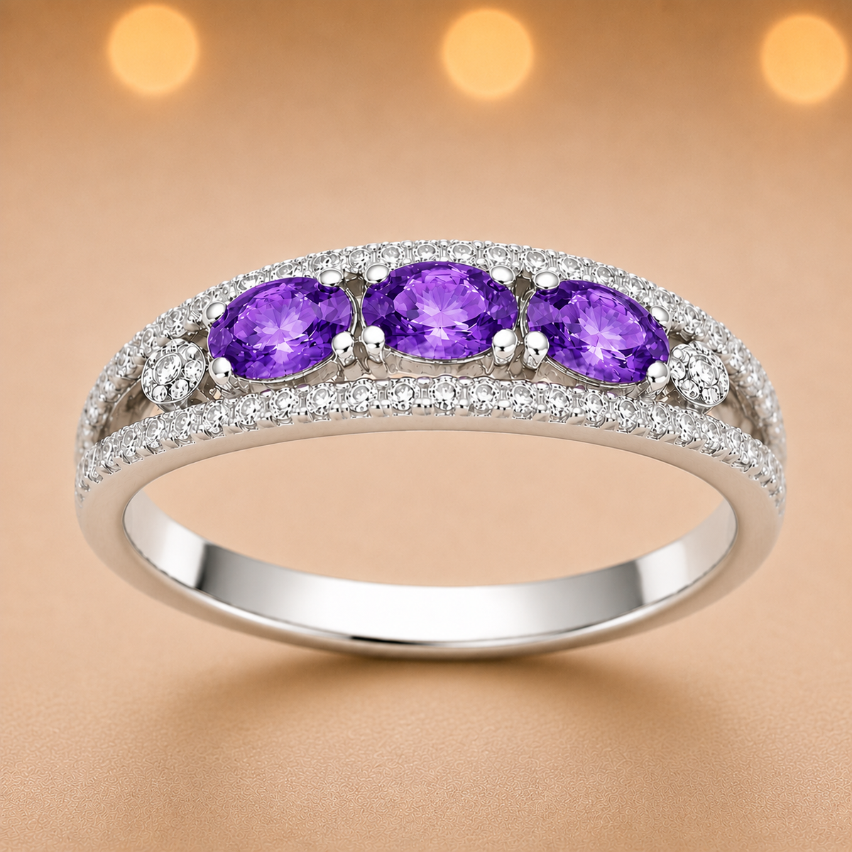 Purple sapphire ring with 5×3 mm oval stones in white gold-plated 925 silver. Elegant, refined, and hypoallergenic. Available now at BSI Jewelry.