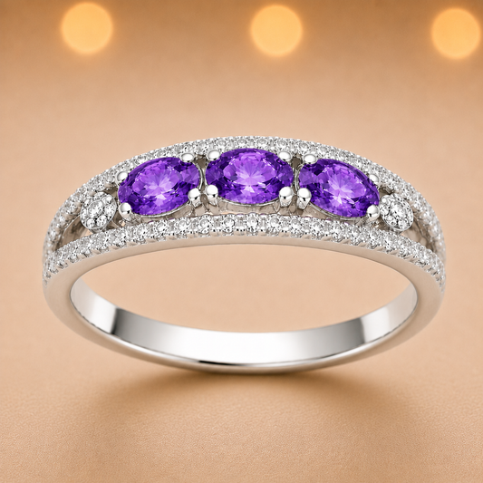 Purple sapphire ring with 5×3 mm oval stones in white gold-plated 925 silver. Elegant, refined, and hypoallergenic. Available now at BSI Jewelry.