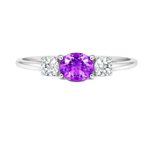 Purple sapphire ring, 5×4 mm oval with moissanite accents in white gold-plated 925 silver. Elegant and hypoallergenic. Available now at BSI Jewelry.
