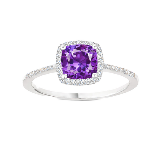 Purple sapphire ring with a 6 mm cushion cut, accented by moissanite in white gold-plated 925 silver. Elegant and timeless. Available now at BSI Jewelry.