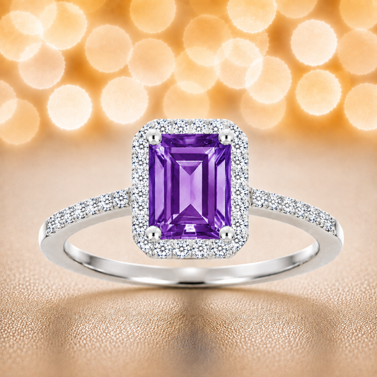 Purple sapphire ring with a 7×5 mm emerald cut, with moissanite in white gold-plated 925 silver. Elegant and timeless for daily wear. Available now at BSI Jewelry.