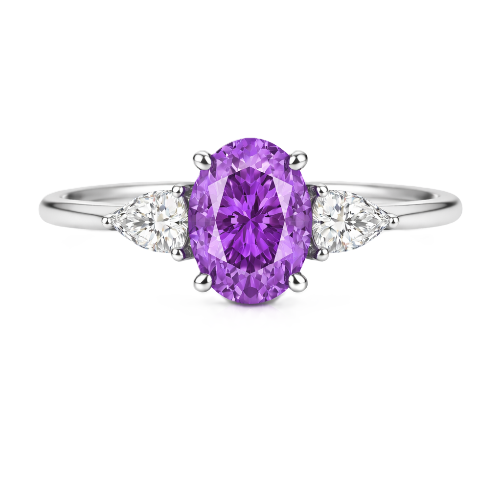 Purple sapphire ring with 7×5 mm oval center in white gold-plated 925 silver. Hypoallergenic silver for comfortable daily wear. Available now at BSI Jewelry.