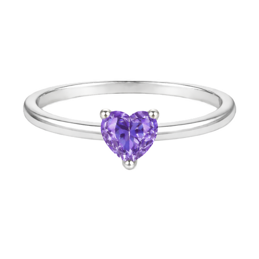 Purple sapphire solitaire ring with a 5 mm heart in white gold-plated 925 silver. Elegant, minimal, and timeless for daily wear. Available now at BSI Jewelry.