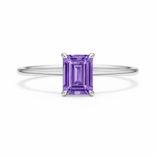 Elegant 6×4 mm emerald-cut purple sapphire ring crafted in white gold-plated 925 silver with palladium alloy. Timeless brilliance. Available now at BSI Jewelry.