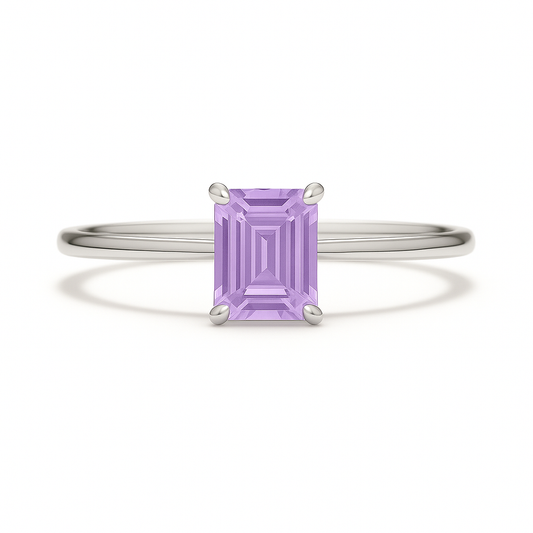 Elegant 6×4 mm emerald-cut purple sapphire ring crafted in white gold-plated 925 silver with palladium alloy. Timeless brilliance. Available now at BSI Jewelry.