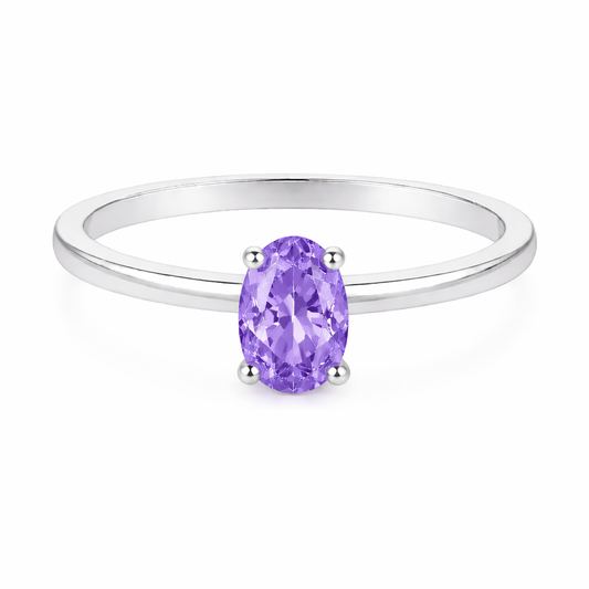 Purple sapphire solitaire ring with a 6×4 mm oval in white gold-plated 925 silver. Elegant, minimal, and timeless for daily wear. Available now at BSI Jewelry.