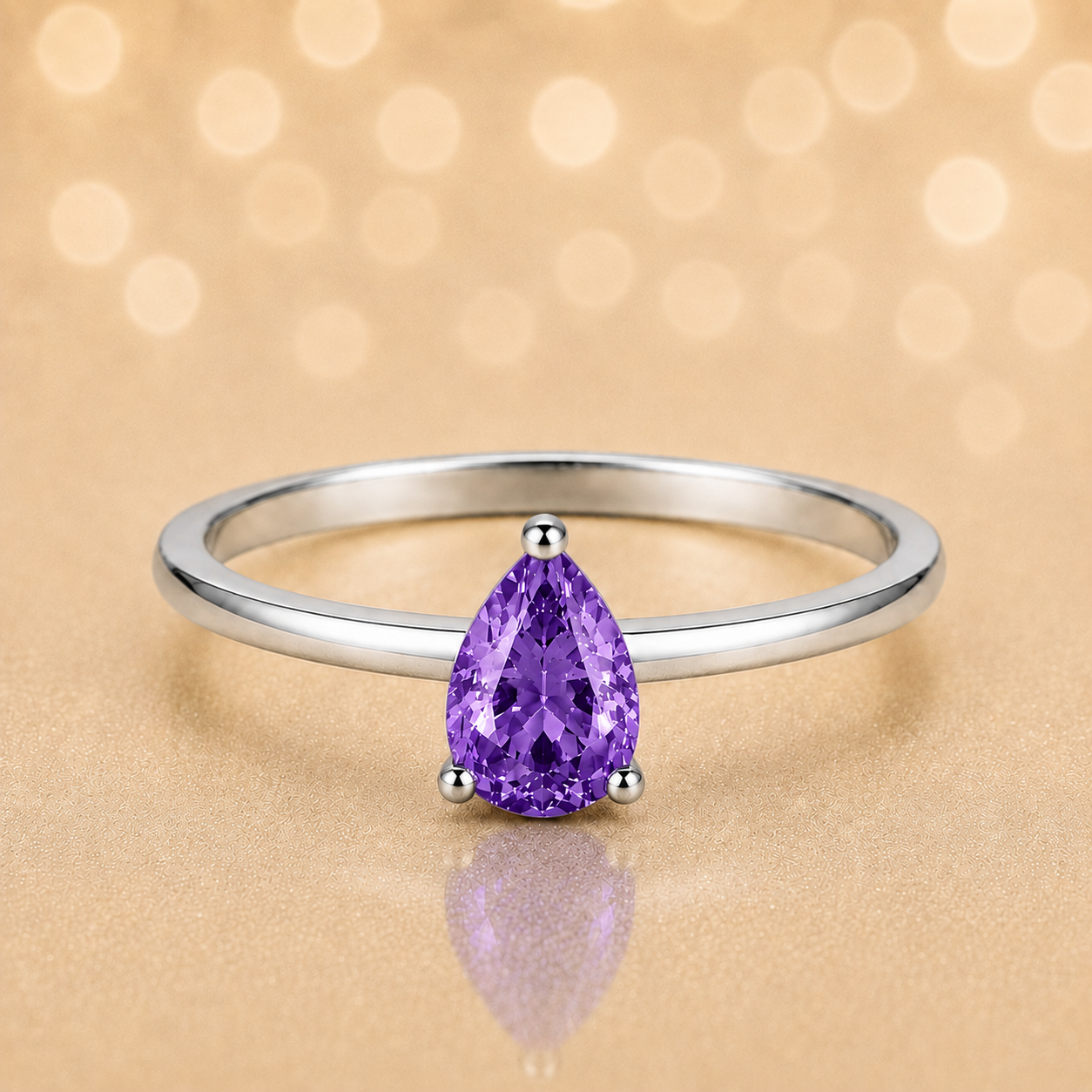 Purple sapphire solitaire ring with a 6×4 mm pear in white gold-plated 925 silver. Elegant, minimal, and timeless for daily wear. Available now at BSI Jewelry.