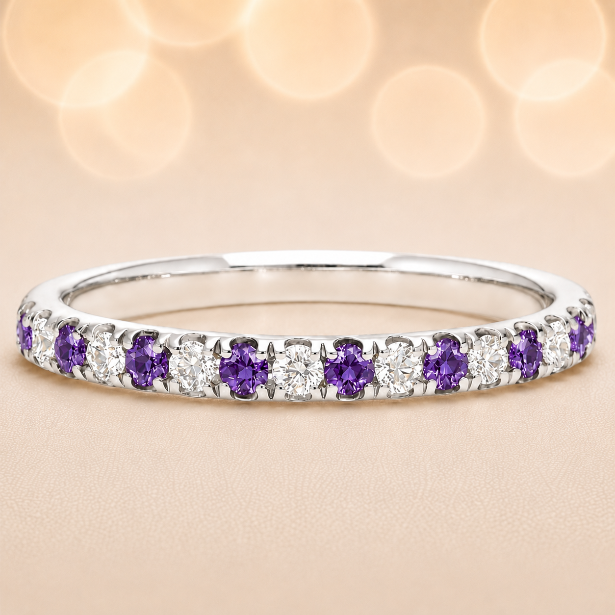 Purple sapphire wedding band with 1.80 mm round-cut stones, crafted in white gold-plated 925 silver and accented with moissanite. Available now at BSI Jewelry.