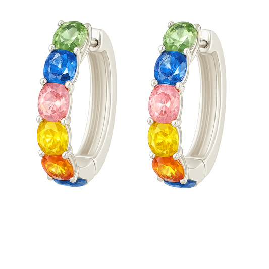 Vibrant rainbow sapphire huggie earrings with 4×3 mm oval-cut stones, crafted in white gold-plated 925 silver with palladium-added alloy. Now at BSI Jewelry.