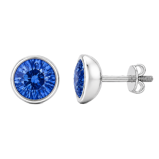 Round blue sapphire stud earrings, 4 mm round, crafted in white gold-plated 925 silver. Elegant screw-back design for daily wear. Available now at BSI Jewelry.