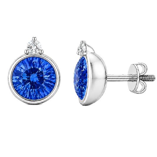 Blue sapphire stud earrings, 5 mm round, crafted in white gold-plated 925 silver. Elegant and hypoallergenic. Available now at BSI Jewelry.